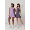 QINSEN Womens Open Back Tennis Dress Sleeveless Built in Shorts Golf Athletic Dress with Pockets(Prune Purple)