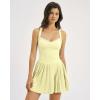 QINSEN Womens V Neck Pleated Tennis Dresses Built in Shorts Cross Back Sleeveless Athletic Dress with Pockets(Yellow)