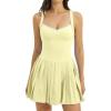 QINSEN Womens V Neck Pleated Tennis Dresses Built in Shorts Cross Back Sleeveless Athletic Dress with Pockets(Yellow)