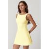 QINSEN Womens Open Back Tennis Dress Sleeveless Built in Shorts Golf Athletic Dress with Pockets(Baby Yellow)